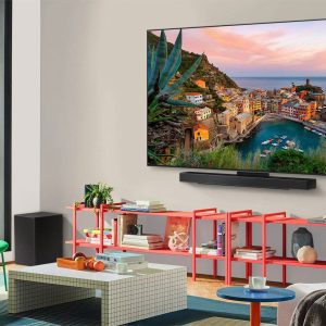 LG 65 inch OLED evo wall-mounted in modern living room with soundbar